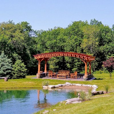 Sebastopol Pergolas (Options: 14' L x 22' Arc W, California Redwood, 4-Post Anchor Kit for High-Wind, Transparent Premium Sealant). Photo Courtesy of Peter King of Shaftsbury, Vermont.