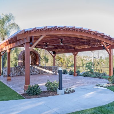 Sebastopol Pergola (Options: 30' L x 24' Arc W, California Redwood, 4 Electrical Wiring Trims, Post Anchor Kit for Concrete, with Rain Guard, 2 Ceiling Fan Bases, Flash End Cuts, 9' Post Height, Transparent Premium Sealant). Photo Courtesy of the Sycuan Casino of San Diego, CA.