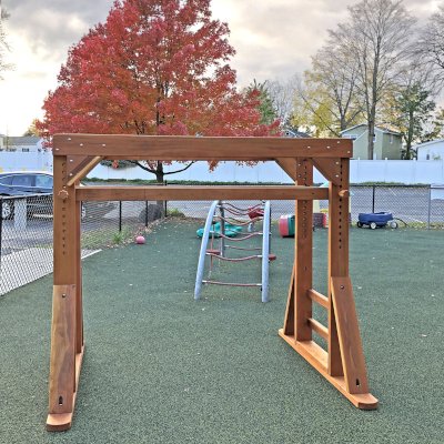 Sheldon's Monkey Bars (Options: 7 ft H, 8 ft L, California Redwood, Custom Step Option, Heavy Duty Timbers by Custom Request, Transparent Premium Sealant). Photo Courtesy of Baldwinsville Nursery School located at 17 W. Genesee Street Baldwinsville, NY.
