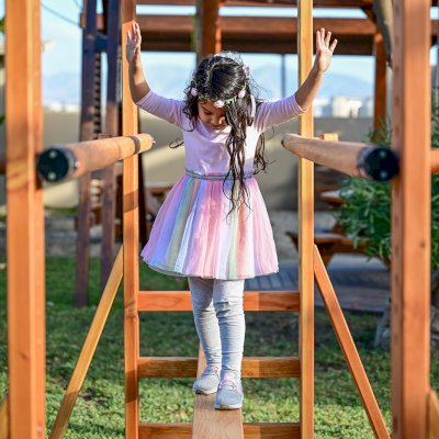 Custom Sheldon's Monkey Bars (Options: 8 ft H, 108.5 ft L, Douglas-fir, Standard Step Option, Transparent Premium Sealant) with Balance Beam and Parallel Bars. Extra Supports Added at the Bottom of the Monkey Bar. Balance Beam Can be Removed and Used Independently.