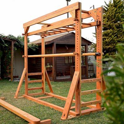 Custom Sheldon's Monkey Bars (Options: 8 ft H, 108.5 ft L, Douglas-fir, Standard Step Option, Transparent Premium Sealant) with Balance Beam and Parallel Bars. Extra Supports Added at the Bottom of the Monkey Bar. Balance Beam Can be Removed and Used Independently.