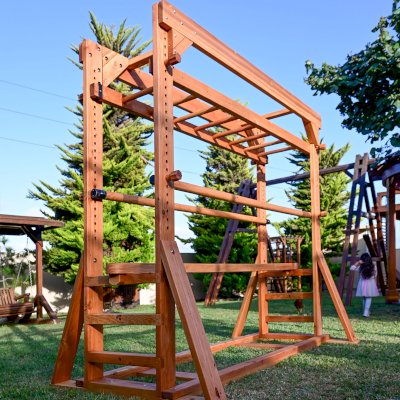Custom Sheldon's Monkey Bars (Options: 8 ft H, 108.5 ft L, Douglas-fir, Standard Step Option, Transparent Premium Sealant) with Balance Beam and Parallel Bars. Extra Supports Added at the Bottom of the Monkey Bar. Balance Beam Can be Removed and Used Independently.