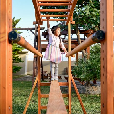 Custom Sheldon's Monkey Bars (Options: 8 ft H, 108.5 ft L, Douglas-fir, Standard Step Option, Transparent Premium Sealant) with Balance Beam and Parallel Bars. Extra Supports Added at the Bottom of the Monkey Bar. Balance Beam Can be Removed and Used Independently.