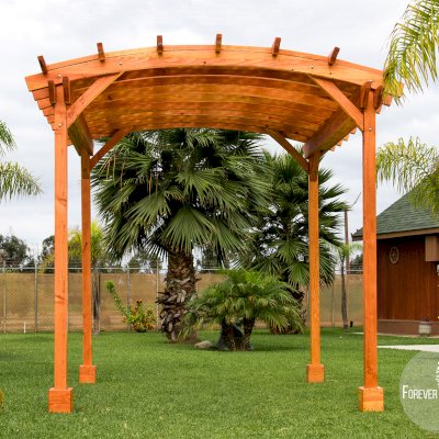 Small Arched Pergola Kits (Options: 10' L x 10' W, No Privacy Panels, Douglas-Fir, No Rain Guard, 9 ft Post Height, No Electrical Wiring Trim, No Decorative Trim, 4-Post Anchor Kit for Concrete, No Curtain Rods, No Retractable Shade Canopy, Transparent Premium Sealant).