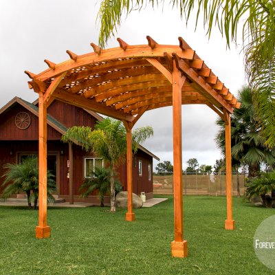 Small Arched Pergola Kits (Options: 10' L x 10' W, No Privacy Panels, Douglas-Fir, No Rain Guard, 9 ft Post Height, No Electrical Wiring Trim, No Decorative Trim, 4-Post Anchor Kit for Concrete, No Curtain Rods, No Retractable Shade Canopy, Transparent Premium Sealant).