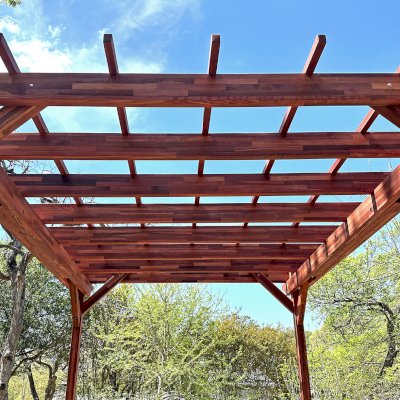 Small Garden Pergola Kit (Options: 12' L x 10' W, No Privacy Panels, Mosaic Redwood, 9.5 ft Post Height, Post Anchor Kit for High-Wind, No Curtain Rods, No Decorative Trims, Cherry Stain Premium Sealant). Photo Courtesy of R. Rao of Dallas, TX.