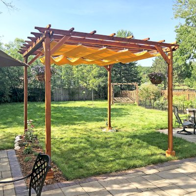 Small Garden Pergola Kit (Options: 12' L x 12' W, No Privacy Panels, California Redwood, 9.5' Post height, 4-Post Anchor Kit for High-Wind, No Curtain Rods, No Decorative Trims,  Transparent Premium Sealant). Custom Canopy purchased form Infinity Canopy. Photo Courtesy of J. Minniti of Lisle, Illinois.