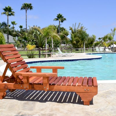 Sol Redwood Patio Lounger (Options: Single, Extra Large 78", Mature Redwood, Add Armrests, 13"H, Include Wooden Wheels, Transparent Premium Sealant). Photo also shows: The Poolside Privacy Panel