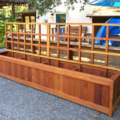 Sonoma Planters (Options: 144" L, 24" W x 24" H, California Redwood, No Seating Ledge, 1" Feet, 3-ft Tall Trellis, Interior and Exterior of Box with Sealant (No Growing Vegetables), Transparent Premium Sealant). Photo Courtesy of B. Smith of Sonoma, CA.