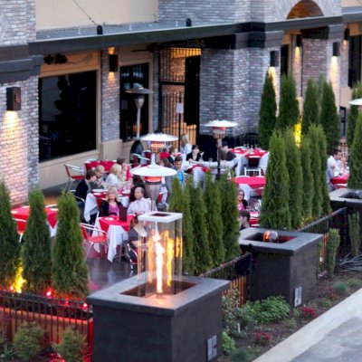 Sonoma Planters (Options: 96" L x 24" W x 24" H, California Redwood, No Seating Ledge, Feet, No Trellis, Interior and Exterior of Box with Sealant (No Growing Vegetables), Transparent Premium Sealant). Photo Courtesy of Savor Restaurant, Fayetteville, AK.