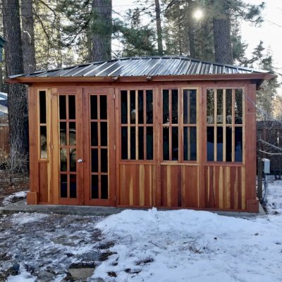 Spa Gazebo Kit (Options: 14' L, 10' W, California Redwood, A Combination of Fixed and Sliding Windows, Without Skylight, 36" H Siding Below Windows, Vertical Siding, French Doors without Screens, No Flooring, Transparent Premium Sealant). Photo Courtesy of D. Wolfe of Chester, California.