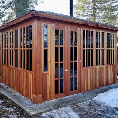 Spa Gazebo Kit (Options: 14' L, 10' W, California Redwood, A Combination of Fixed and Sliding Windows, Without Skylight, 36" H Siding Below Windows, Vertical Siding, French Doors without Screens, No Flooring, Transparent Premium Sealant). Photo Courtesy of D. Wolfe of Chester, California.