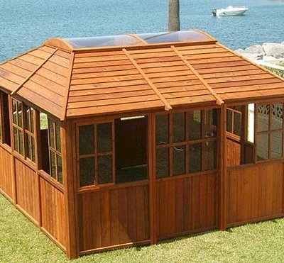 Spa Gazebo Kit (Options: 10' L, 14' W, California Redwood, All Sliding Windows with Screens, 4' x 6' Skylight, 36" H Siding Below Windows, Vertical Siding, Japanese Doors with Screens, No Flooring, Transparent Premium Sealant). Photo Courtesy of Richard S. of Loveland, Colorado.