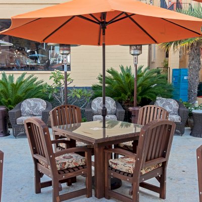 Square Patio Tables (Options: 3.5', 4 Chairs, Mosaic Redwood, Luna Style Chairs, All Armchairs, Custom Cushions, Standard Tabletop, Slightly Rounded Corners, 1-5/8in Umbrella Hole, Coffee-Stain Premium Sealant). Photo Courtesy of C. Ledesma of La Jolla, CA.
