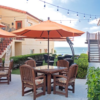 Square Patio Tables (Options: 3.5', 4 Chairs, Mosaic Redwood, Luna Style Chairs, All Armchairs, Custom Cushions, Standard Tabletop, Slightly Rounded Corners, 1-5/8in Umbrella Hole, Coffee-Stain Premium Sealant). Photo Courtesy of C. Ledesma of La Jolla, CA.