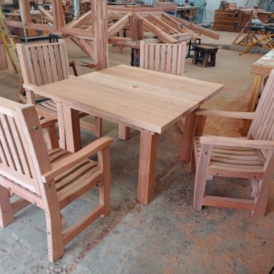 Square Patio Table Set in Production (Options: 4', Mature Redwood, 4 Ruth Chairs, All Arm Chairs, Slightly Rounded Corners, 1 5/8" Umbrella Hole).