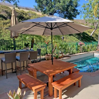 Square Patio Tables (Options: 5', 4 Benches, California Redwood, Patio Benches, Standard Tabletop, Slightly Rounded corners, No Umbrella Hole, Transparent Premium Sealant). Photo Courtesy of David & Susan Kaye of Oakpark, California.