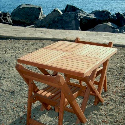 Square Wooden Folding Table (Options: 2 Folding Chairs, Douglas-fir, No Cushions, Standard Tabletop, Checkerboard Design, Squared Corners, No Umbrella Hole, Transparent Premium Sealant). Photo Courtesy of Quintas Papagayo's Hotel, Ensenada, Mexico.