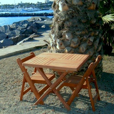 Square Wooden Folding Table (Options: 2 Folding Chairs, Douglas-fir, No Cushions, Standard Tabletop, Checkerboard Design, Squared Corners, No Umbrella Hole, Transparent Premium Sealant). Photo Courtesy of Quintas Papagayo's Hotel, Ensenada, Mexico.