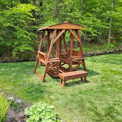 St. Anthony's Face to Face Gliders (Adult Size, Old-Growth Redwood, Standard Closed Roof, With Beverage Armrests, With Kid's Platform, No Engraving, Transparent Premium Sealant). Photo Courtesy of J. Peckham of Dorset, VT.