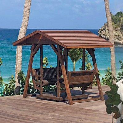 St. Anthony's Face to Face Gliders (Extra Wide, Mature Redwood, With Beverage Armrests, With Kid's Platform, Extra Wide Roof, No Engraving, Coffee-Stain Premium Sealant). Photo Courtesy of Anonymous Customer in Saint-Barthélemy Island.