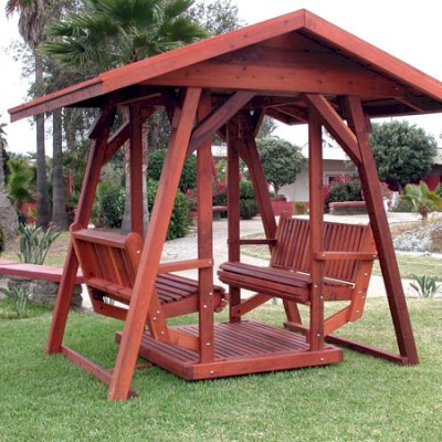 St. Anthony's Face to Face Gliders (XW, Old-Growth Redwood, No Kid's Platform, XW Roof, No Engraving, Transparent Premium Sealant).