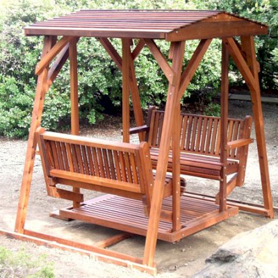 St. Anthony's Face to Face Gliders (Adult Size, Mature Redwood, No Kid's Platform, Standard Closed Roof, No Engraving, Transparent Premium Sealant).