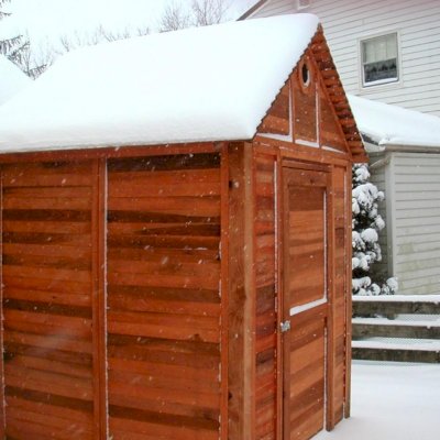 Storage Mini Barns (Options: 6' W, 6' D, 7' H, California Redwood, Single Door, Transparent Premium Sealant).  Yes, the roof and overall structure is plenty strong to take the weather head on...