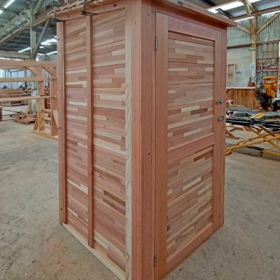 Storage Shed (Options: 3' W x 3' D x 7' H, Mosaic Redwood). Photo taken in production. 