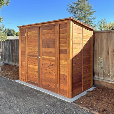 Storage Shed (Options: 8' W, 4' D, 6.5' H, California Redwood, Double Doors, Roof Inclination: From Door to Back, 1 Shelf, No Deck, Transparent Premium Sealant). Photo Courtesy of B. Payne of Los Altos, CA.