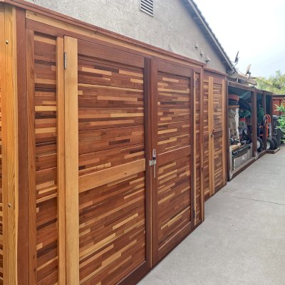 Storage Sheds (Options: 8' W, 3' D, 7' H & 5' W, 2' D, 7' H, Mosaic Redwood, Double Doors, Inclination of The Roof to Be From Back to Door, No Shelving, Transparent Premium Sealant). 