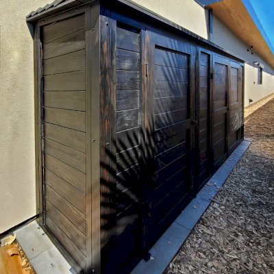Storage Shed (Options: 12' W x 2.5' D x 7' H, Douglas-fir, Black Stain Premium Sealant). Photo Courtesy of F. Voss of Bellevue, Washington.