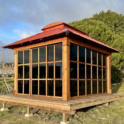 Sun Gazebo with Sliding Doors (Options: 12' L x 10' W, California Redwood, 7 ft Wall Height, 4' x 6' Skylight, with 4 Sliding Walls, No Floor, with Metal Roof, Transparent Premium Sealant). Photo Courtesy of C. Turner of Bodega Bay, CA.