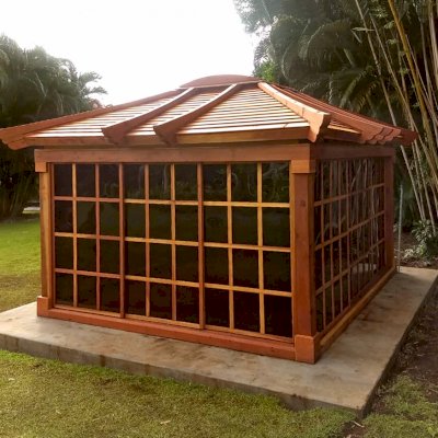 Sun Gazebo with Sliding Doors (Options: 14' L, 12' W, California Redwood, 4' x 4' Skylight, Standard Wood Roof, Complete Floor, Transparent Premium Sealant). Photo Courtesy of C. Tokars of Kaneohe, Hawaii.