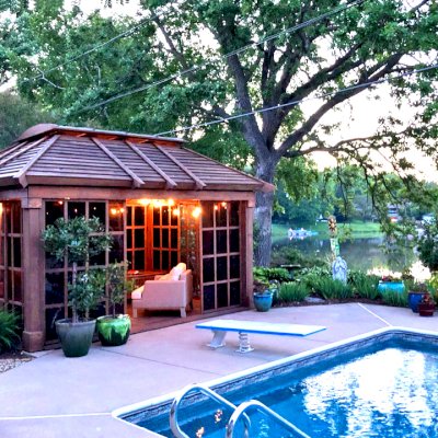 Sun Gazebo with Sliding Doors (Options: 14' L, 10' W, Douglas-fir, 4' x 8' Skylight, Standard Wood Roof, Hardware Kit for Stone, Brick or Concrete, No Floor,  Coffee-Stain Premium Sealant). Photo Courtesy of D. Womack of White Bear Lake, Minnesota.