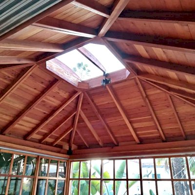 Sun Gazebo with Sliding Doors (Options: 14' L, 14' W, California Redwood, 8 ft Wall Height, 4' x 4' Skylight, Complete Floor, Transparent Premium Sealant). Photo Courtesy of M. Wunderman of Los Angeles, CA.