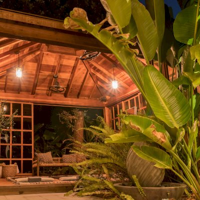 Sun Gazebo with Sliding Doors (Options: 14' L, 14' W, California Redwood, 8 ft Wall Height, 4' x 4' Skylight, Complete Floor, Transparent Premium Sealant). Photo Courtesy of M. Wunderman of Los Angeles, CA.
