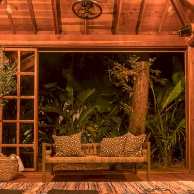 Sun Gazebo with Sliding Doors (Options: 14' L, 14' W, California Redwood, 8 ft Wall Height, 4' x 4' Skylight, Complete Floor, Transparent Premium Sealant). Photo Courtesy of M. Wunderman of Los Angeles, CA.
