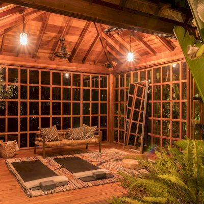 Sun Gazebo with Sliding Doors (Options: 14' L, 14' W, California Redwood, 8 ft Wall Height, 4' x 4' Skylight, Complete Floor, Transparent Premium Sealant). Photo Courtesy of M. Wunderman of Los Angeles, CA.