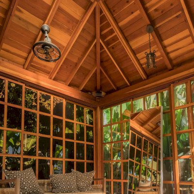 Sun Gazebo with Sliding Doors (Options: 14' L, 14' W, California Redwood, 8 ft Wall Height, 4' x 4' Skylight, Complete Floor, Transparent Premium Sealant). Photo Courtesy of M. Wunderman of Los Angeles, CA.
