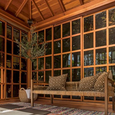 Sun Gazebo with Sliding Doors (Options: 14' L, 14' W, California Redwood, 8 ft Wall Height, 4' x 4' Skylight, Complete Floor, Transparent Premium Sealant). Photo Courtesy of M. Wunderman of Los Angeles, CA.
