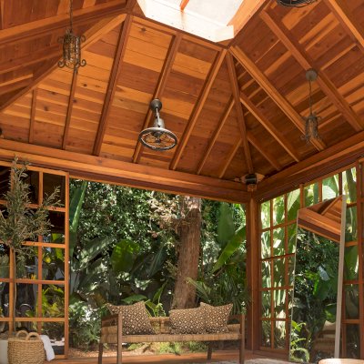Sun Gazebo with Sliding Doors (Options: 14' L, 14' W, California Redwood, 8 ft Wall Height, 4' x 4' Skylight, Complete Floor, Transparent Premium Sealant). Photo Courtesy of M. Wunderman of Los Angeles, CA.
