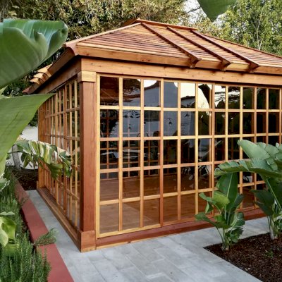 Sun Gazebo with Sliding Doors (Options: 14' L, 14' W, California Redwood, 8 ft Wall Height, 4' x 4' Skylight, Complete Floor, Transparent Premium Sealant). Photo Courtesy of M. Wunderman of Los Angeles, CA.