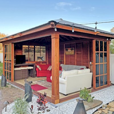 Sun Gazebo with Sliding Doors (Options: 18' L, 12' W, California Redwood, Without Skylight, No Flooring, Transparent Premium Sealant). Photo Courtesy of M. Skapik of Palm Harbor, FL.