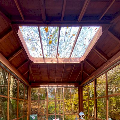 Sun Gazebo with Sliding Doors (Options: Custom Size 12' L x 12' W, California Redwood, 9 ft Wall Height, With 4' x 8' Skylight, Complete Floor, with Wood Shingle Roof, Transparent Premium Sealant). Photo Courtesy of M. Zamanzadeh of Presto Pennsylvania.