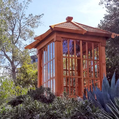 Sun Gazebo with Sliding Doors (Options: Custom Size 6' L x 6' W, Douglas-fir, 7 ft Wall Height, Without Skylight, Complete Floor, Transparent Premium Sealant). Clear Polycarbonate Windows by Custom Request. Photo Courtesy of T. Standing of Hollywood, CA.