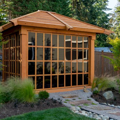Sun Gazebo with Sliding Doors (Options: Custom Size 10' L x 8' W, Douglas-fir, 7 ft Wall Height, Without Skylight, Complete Floor, Standard Wood Roof, Transparent Premium Sealant). Photo Courtesy of Tony Branton of Bellevue, Washington.