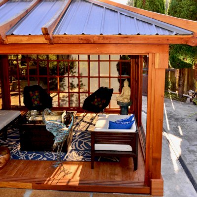 Sun Gazebo with Sliding Doors (Options: 14' L, 12' W, California Redwood, 4' x 6' Skylight, Complete Floor, Transparent Premium Sealant). Metal roof added by custom request. Photo Courtesy of A. Ramon of South San Francisco, CA. Note: Metal Roof provided by Home Depot: 12ft. Classic Rib Steel Roof Panel in Charcoal, Model #2313417, Internet #204255071