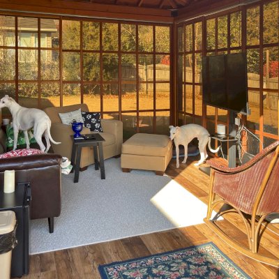 Sun Gazebo with Sliding Doors (Options: 14' L, 12' W, California Redwood, Metal Roof, 8 ft Wall Height, Without Skylight, with One Solid Wall by Custom Request, No Flooring [Installed on Existing Slab], Transparent Premium Sealant). Photo Courtesy of K. Bowser of Fairfax, VA.