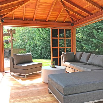 Sun Gazebo with Sliding Doors (Options: 14' L, 12' W, California Redwood, 3' x 5' Skylight, Complete Floor, Transparent Premium Sealant). Photo Courtesy of P. Gee of Sammamish, WA.